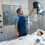 medical device imagery of doctor using device to monitor patient